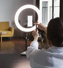 Woman recording a video on her phone